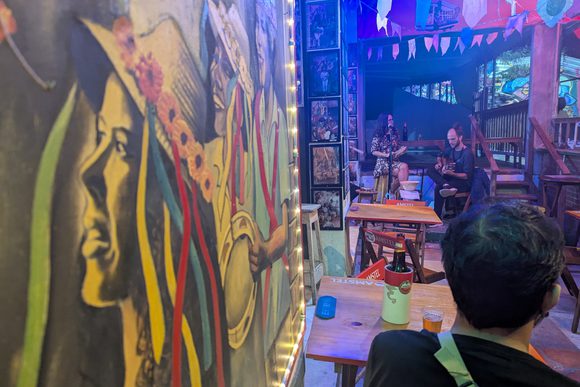 vibrant musical mural with a couple playing live music in santa teresa