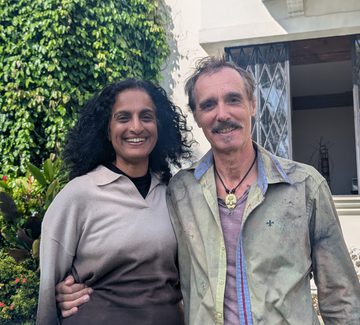 smiling lady and man at a guesthouse in rio