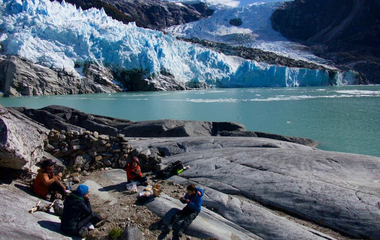 Chile patagonia carretera austral family picnic lunch at face of leones glacier c pura aventura thomas power