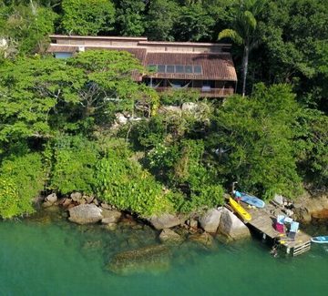 aerial shot of waterfront house near paraty