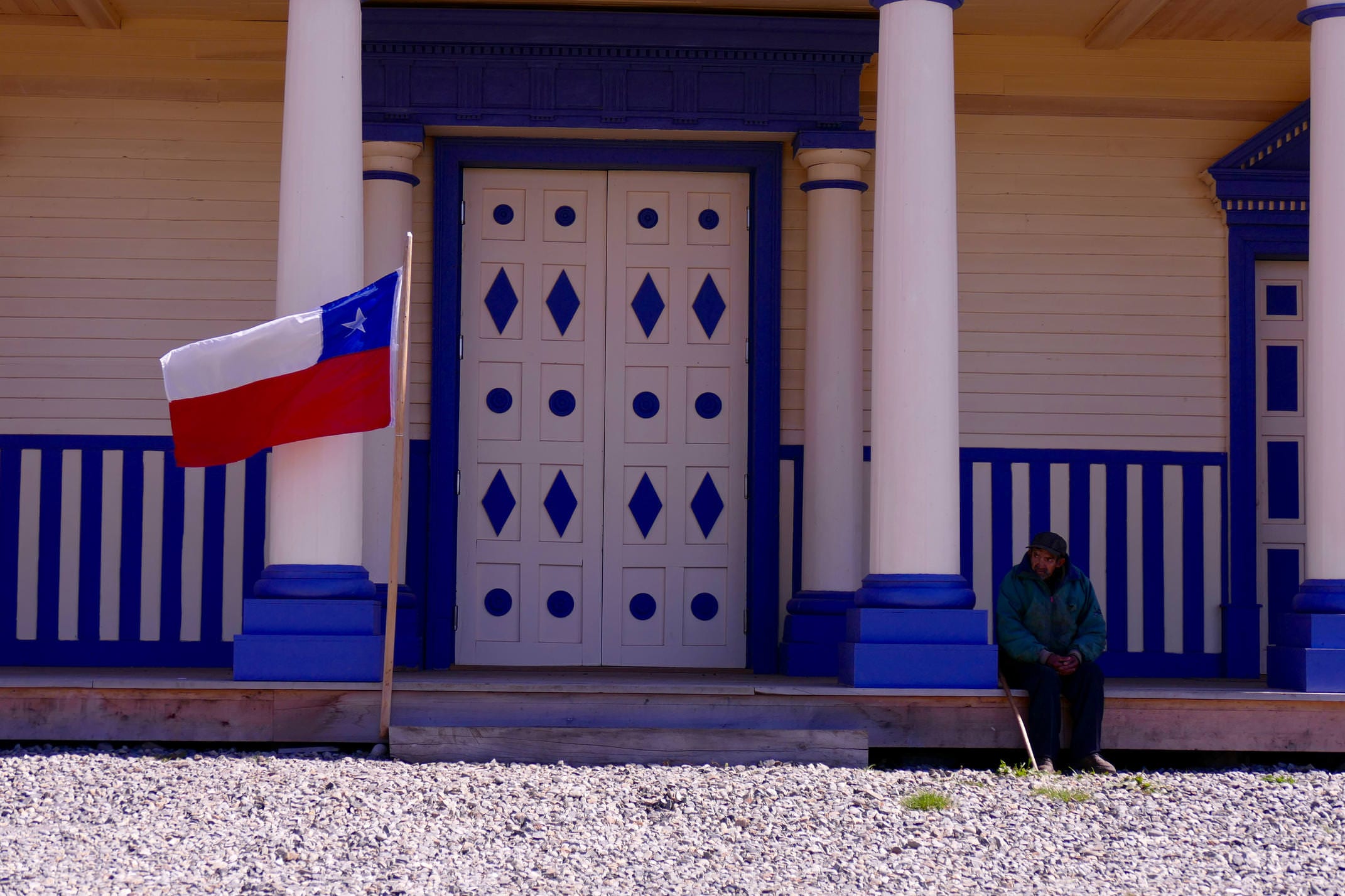 Chile chiloe man in front of church