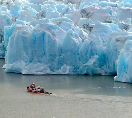 Chile patagonia torres del paine boat navigating face of glacier grey cropped
