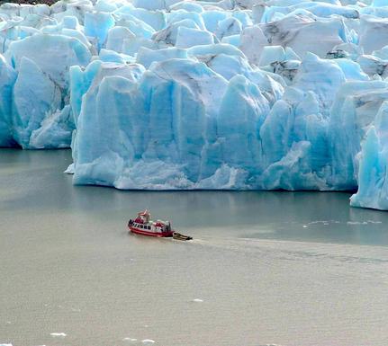 Chile patagonia torres del paine boat navigating face of glacier grey