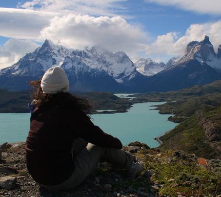 Chile patagonia torres del paine patagonia camp girl sitting view over massif