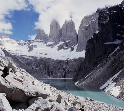 Chile patagonia torres del paine view across glacial lake to torres peaks