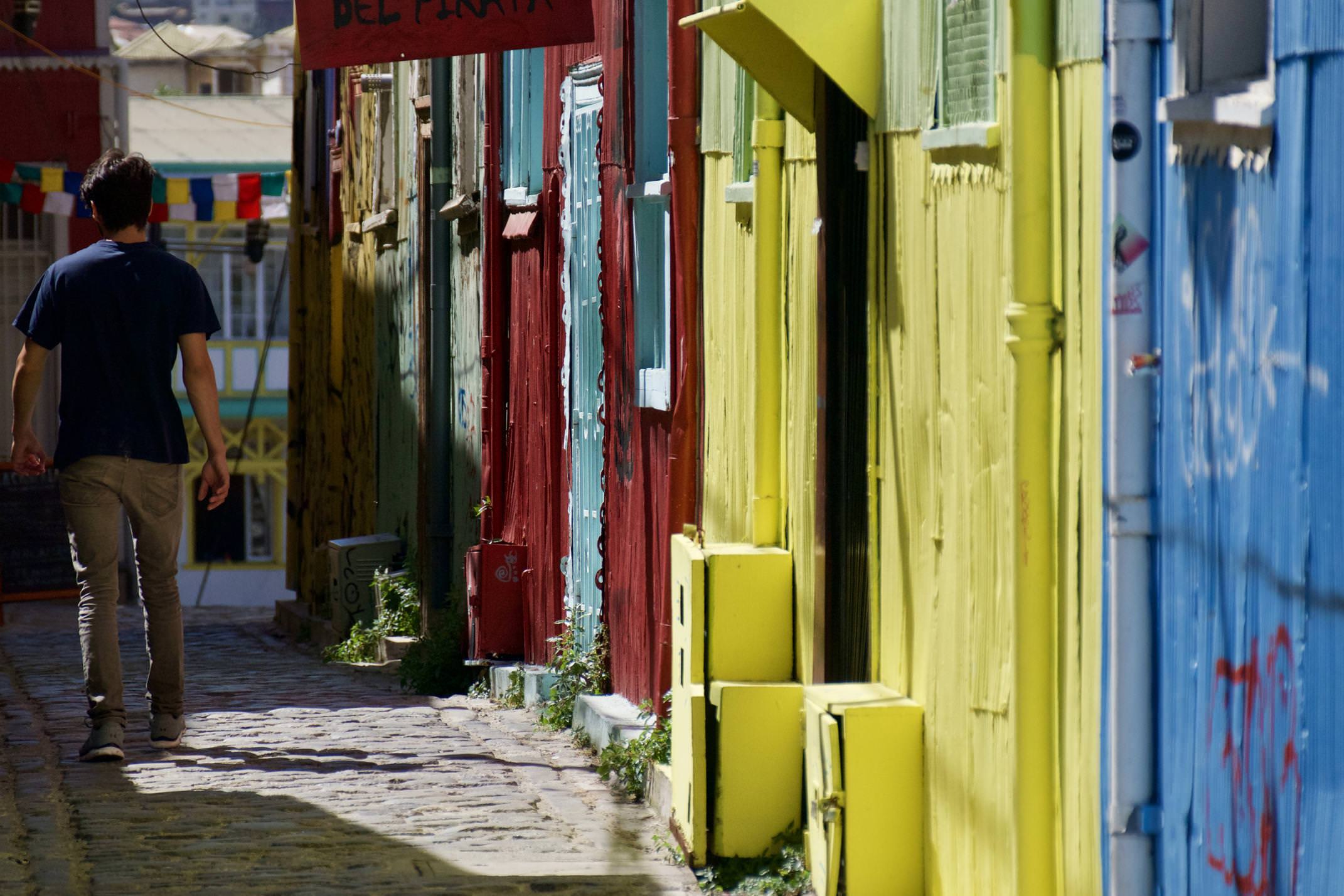 Chile valparaiso colourful street man walking