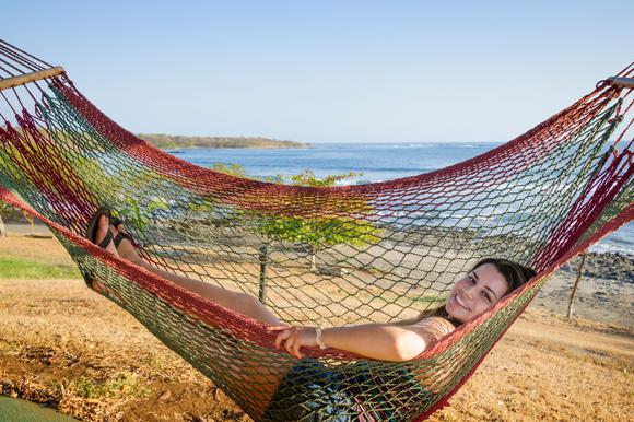 girl in hammock on costa rica beach