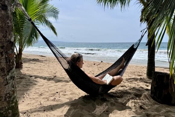 lady in hammock on beach