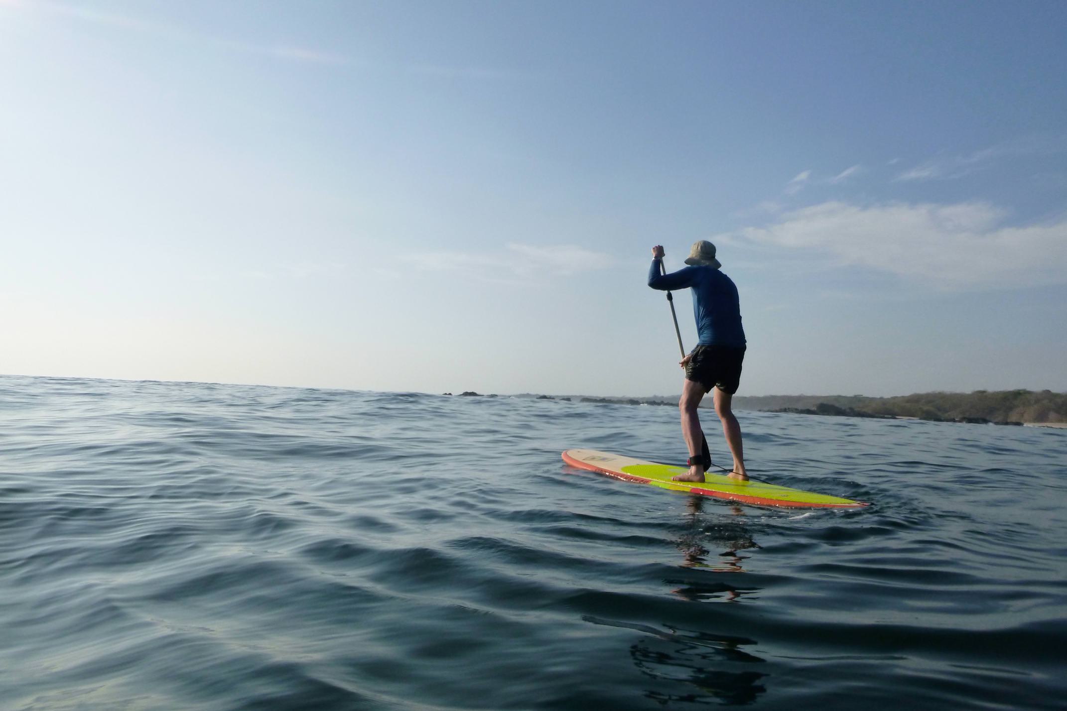 Costa rica nicoya peninsula stand up paddleboarding off san juanillo beach