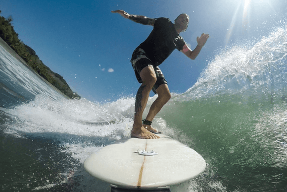 boy surfing nicoya peninsula