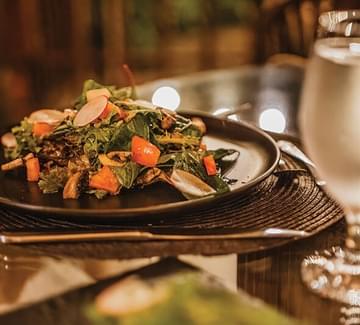 fresh salad on a plate in romantic lighting