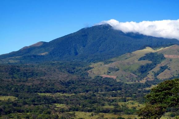 a wide view of the forested slopes of miravalles volcano in costa rica