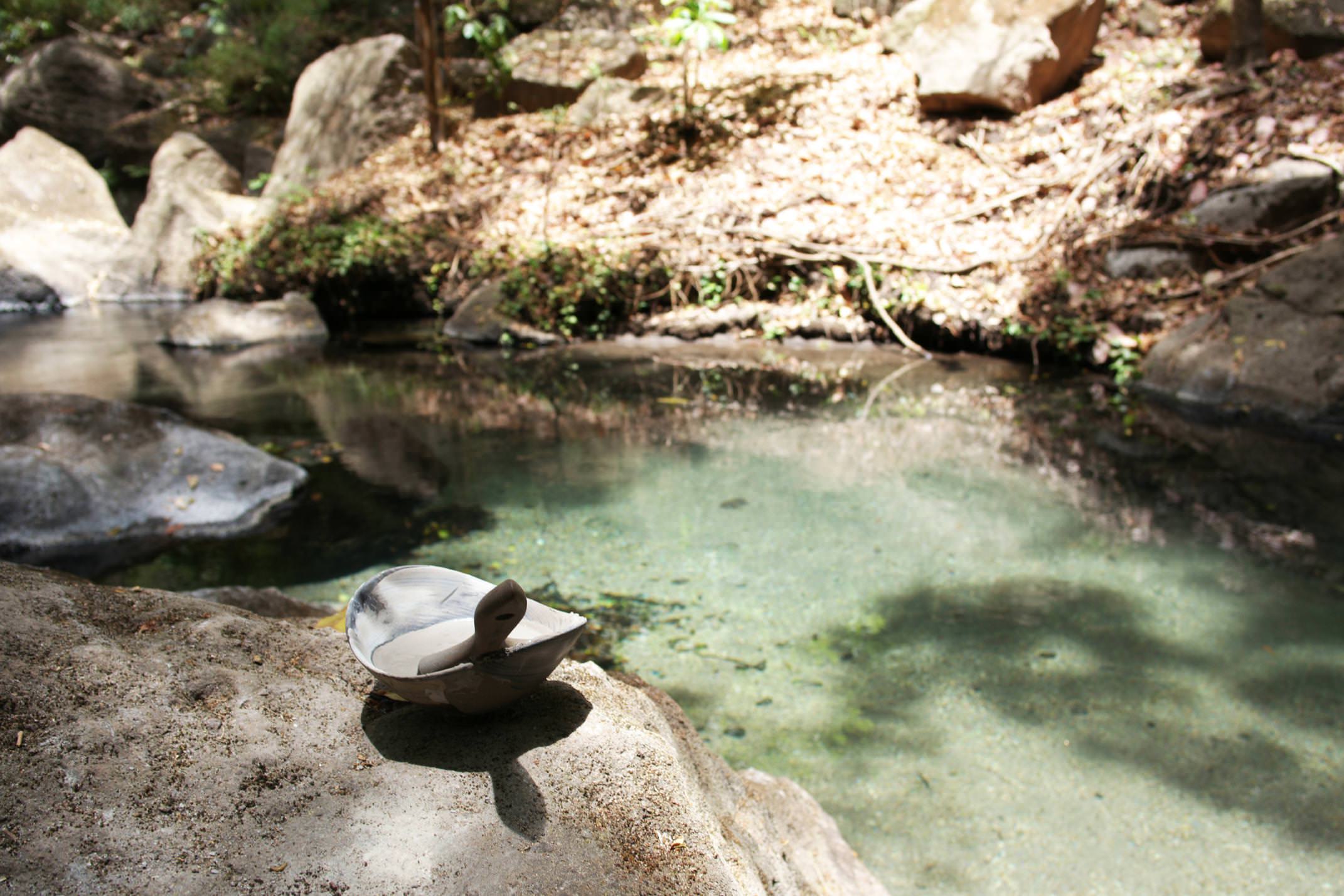 Costa rica tenorio rio perdido volcanic mud in bowl by river