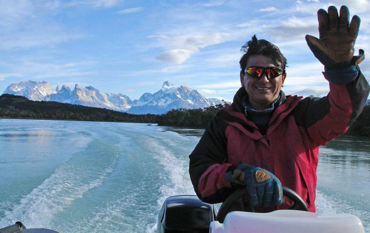 Chile patagonia torres del paine rio serrano zodiac ride waving captain