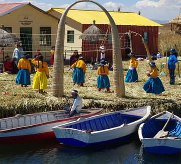 local kids playing volleyball uros islands lake titicaca