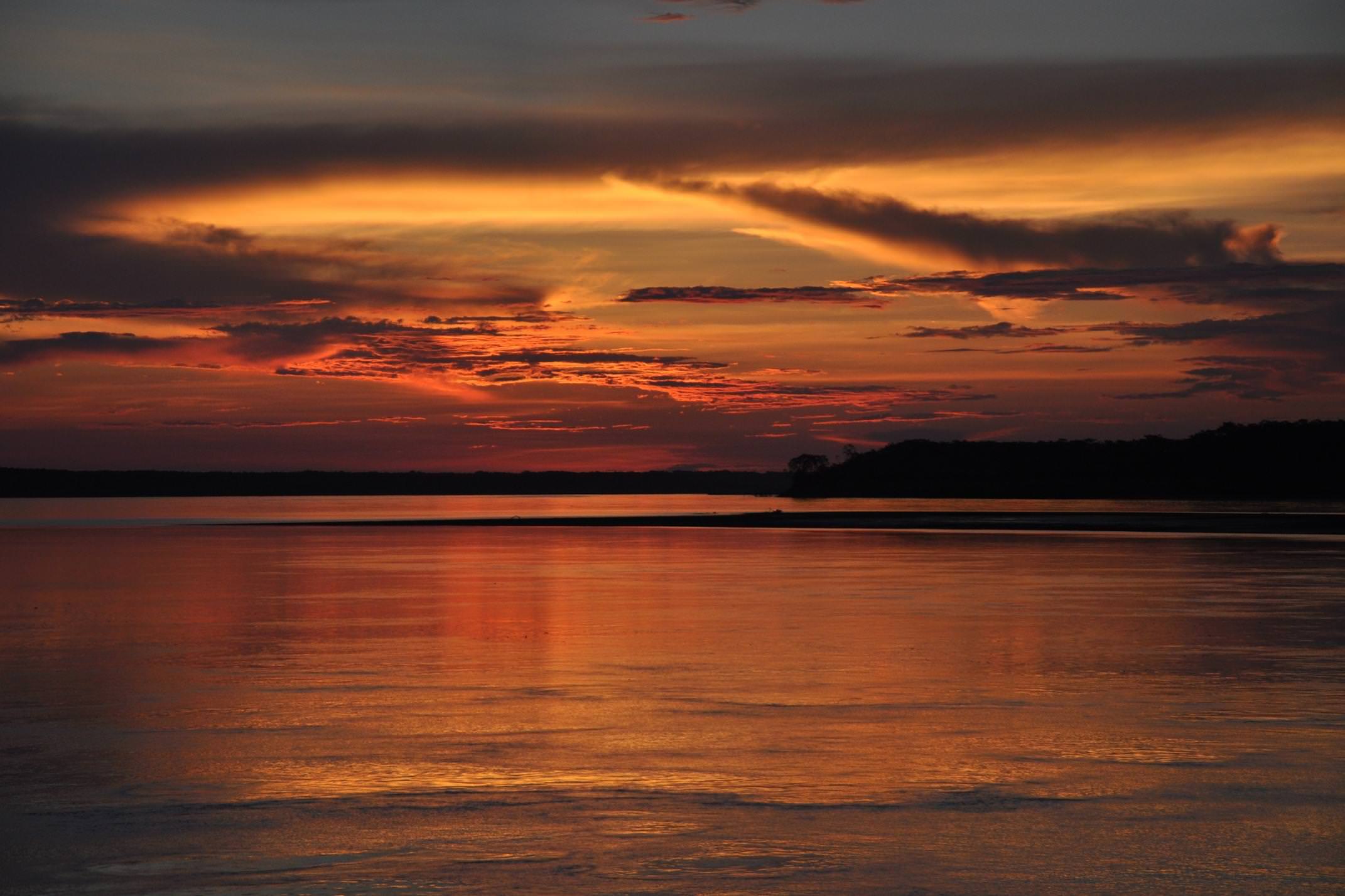 Peru amazon sunset over river