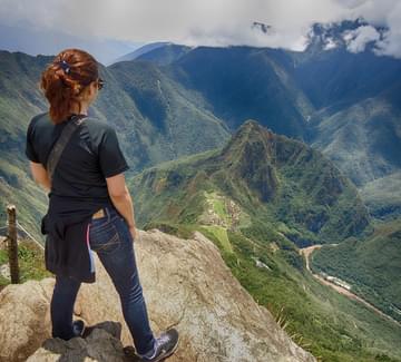 sitting at sun gate machu picchu
