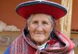 Peru sacred valley chinchero weaver old lady smiling