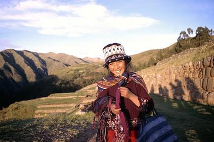 Peru sacred valley girl selling trinkets