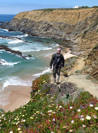 Portugal alentejo rota vicentina cliff hiker flowers c diego pura
