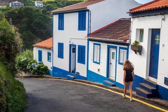 girl walking in village on sao miguel island