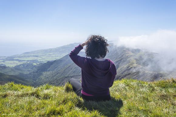 woman looking over mountains nordeste sao miguel
