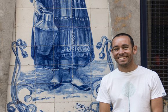 guide posing for photo in lisbon