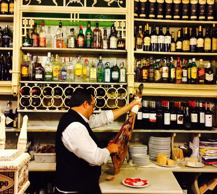 Spain andalucia seville tapas ham carving in rinconcillo