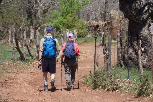 couple walking in the sierra de aracena