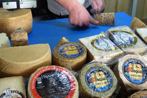 cheese for sale on market in grazalema