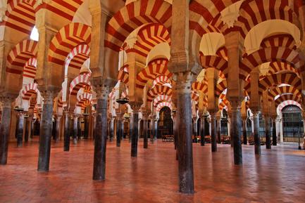 mezquita red white arches cordoba spain