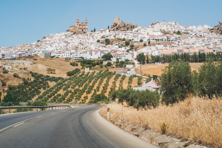 driving below white village in andalucia