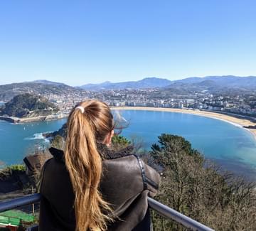 girl enjoying view over la concha bay