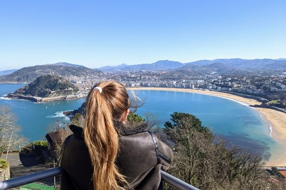 girl enjoying view over la concha bay