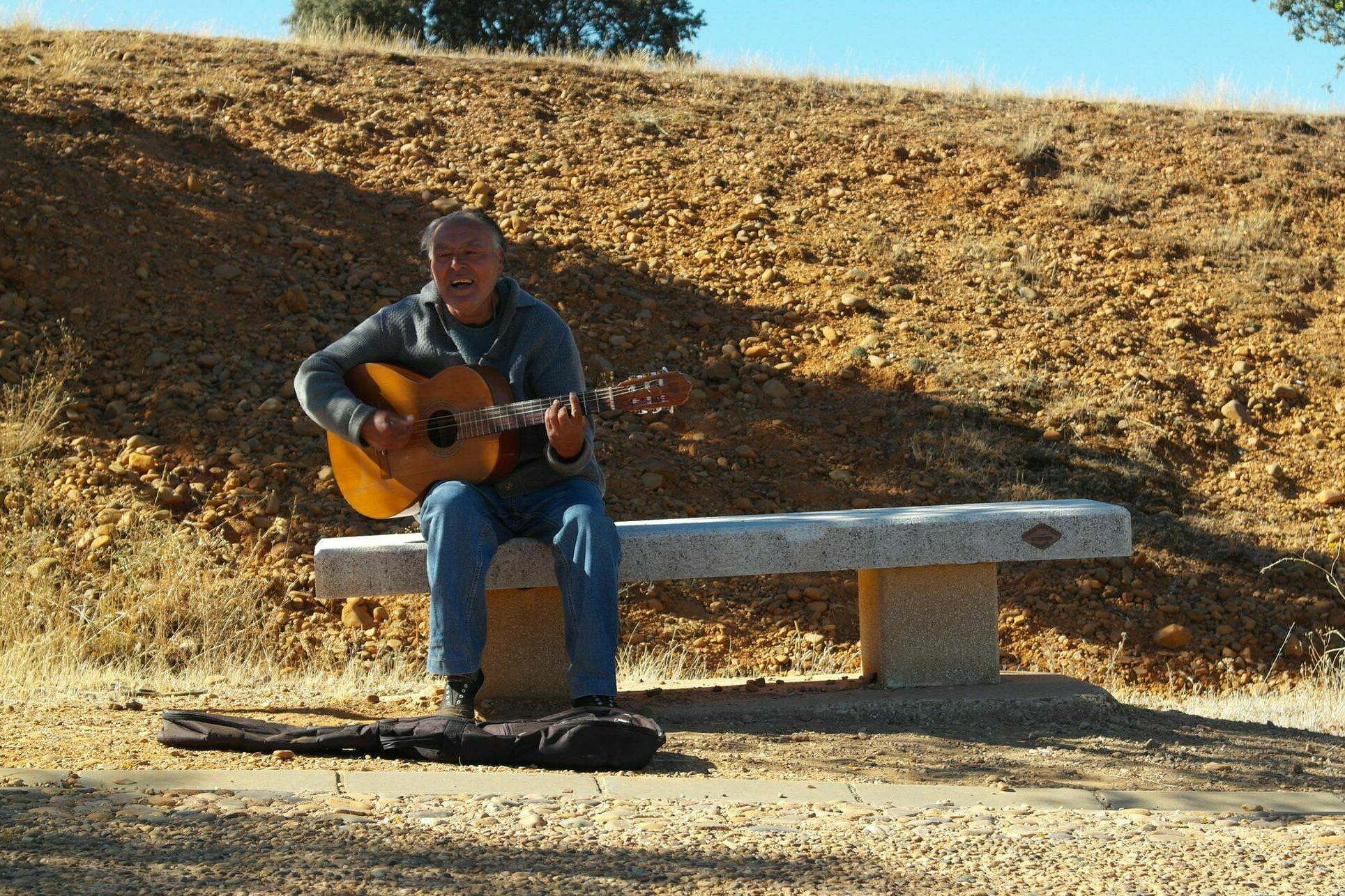 Spain camino de santiago guitar player astorga