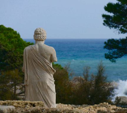 Spain catalonia greek god statue empuries copyright Thomas Power Pura Aventura