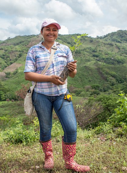 Taking root nicaragua 2013 planting technician berta with treeling