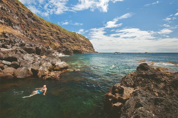 floating in natural pool in the azores