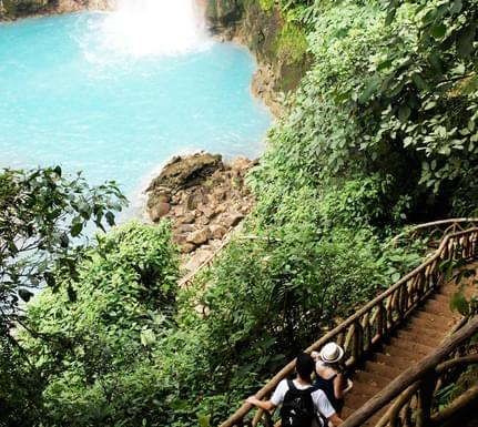 Costa rica tenorio volcano national park walking down to rio celeste waterfall